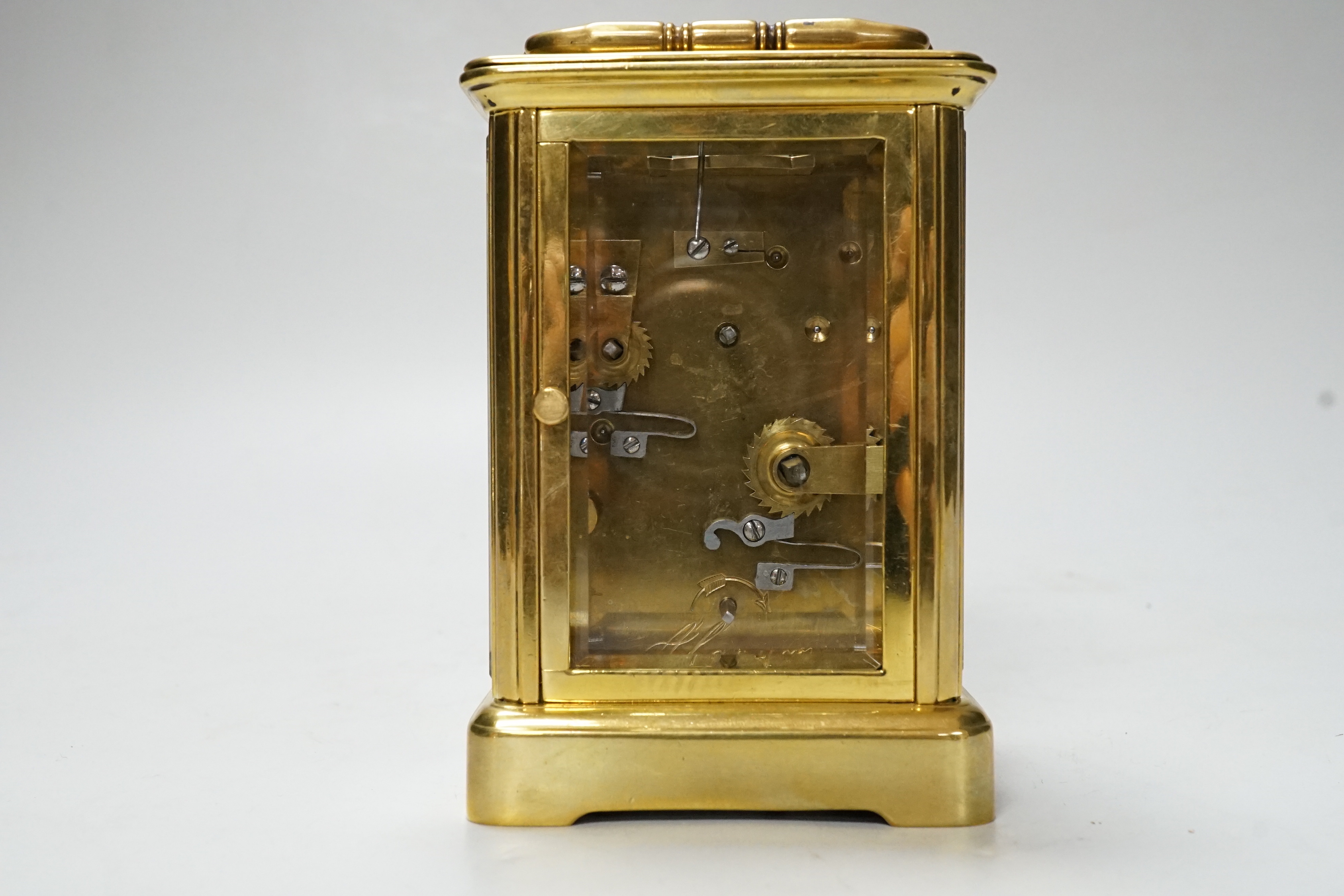 A cased carriage timepiece with alarm